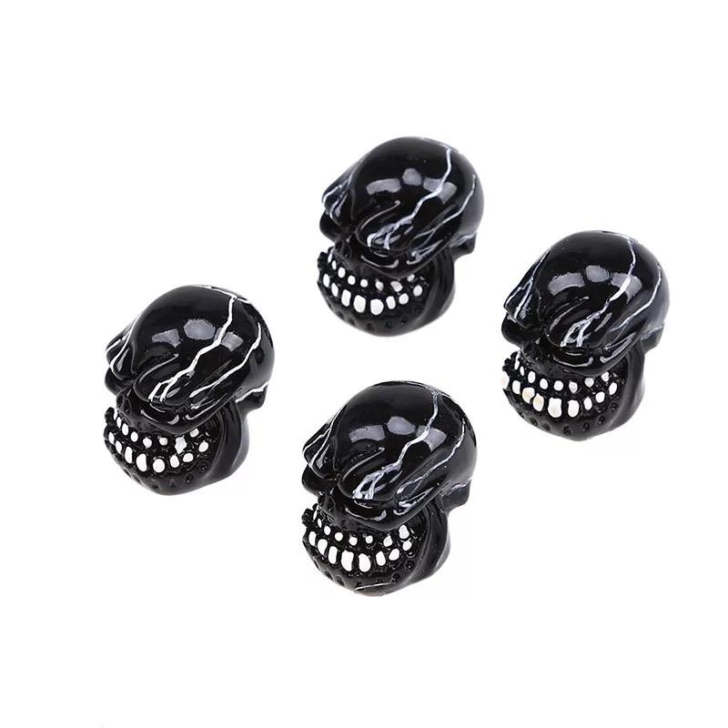 DTouch ventieldoppen Black Skull zwart 4 stuks